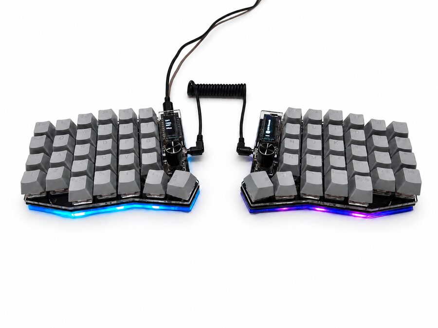 Assembled Sofle with gray keycaps, photographed on a white background
